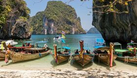 Tranquil Koh Samui coastline at dusk for a Koh Samui Tours banner by Legend Travel Group.